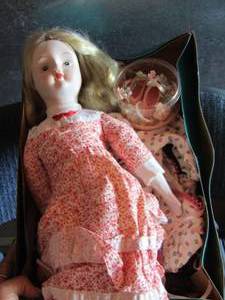 lot 97 image: doll she has shoes and other clothes no name