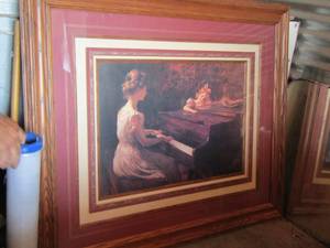 lot 6 image: Lady playing piano framed art