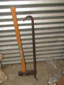 lot 116 image: crow bar and a ax
