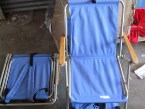 lot 120 image: blue fold up chairs they have straps so you can carrt them on your back