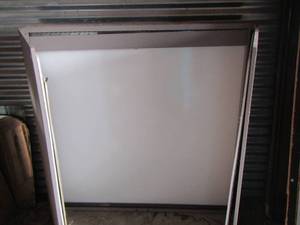 lot 5 image: white board and poster board all in one hangs on the wall