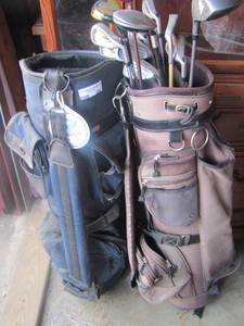lot 202 image: green golf bag, taan golf bag with various clubs