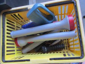 lot 217 image: yellow crate of various flashlights