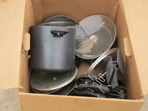 lot 244 image: pots and pans with various lids and kitchen utensails