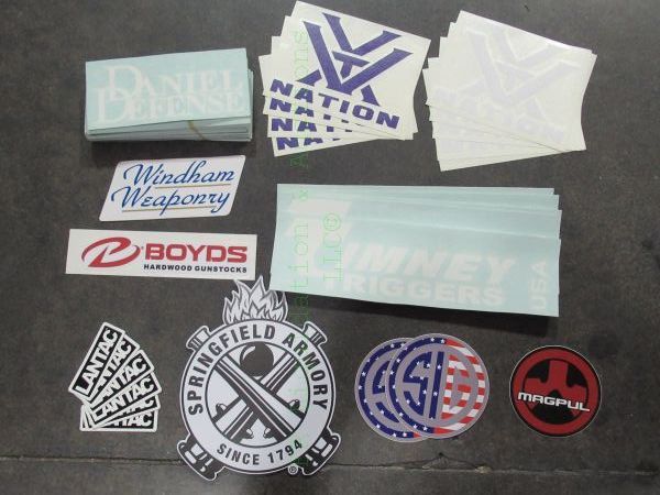 lot 40 image: Firearms manufacturers decals
