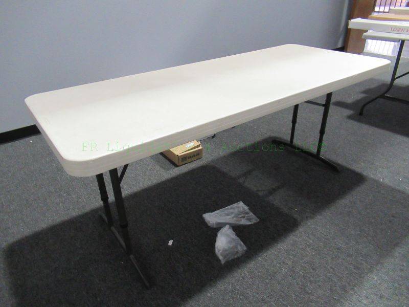 lot 826 image: Plastic top folding table 72 x 30 x 28