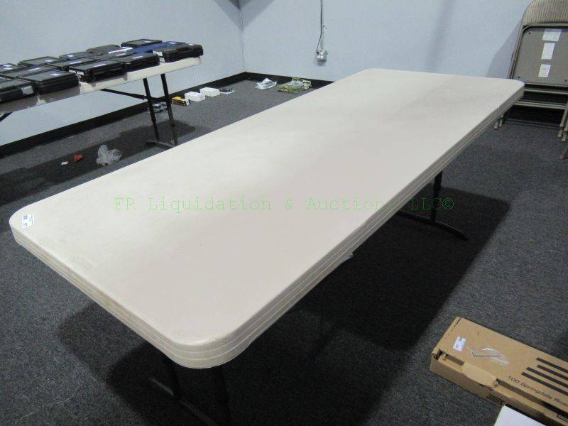lot 825 image: Plastic top folding table 72 x 30 x 28