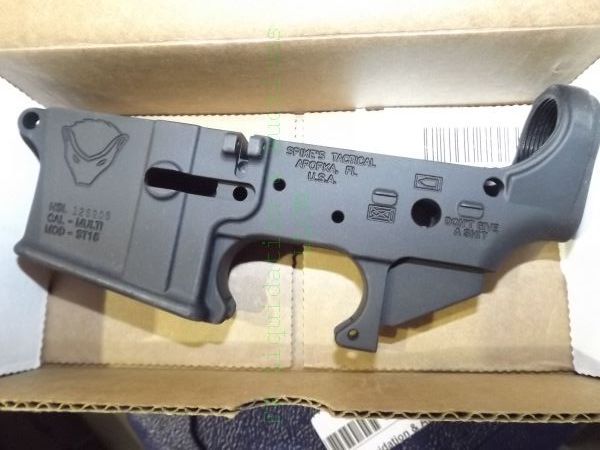 lot 849 image: NEW Spikes tactical AR15 lower receiver