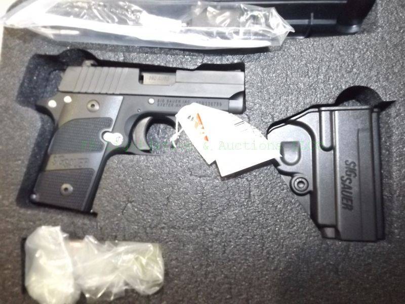 lot 855 image: NEW in box Sig Sauer .380 automatic pistol