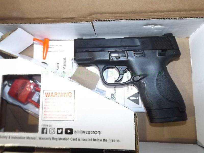 lot 886 image: NEW in box Smith & Wesson M & P shield 9mm automatic pistol with accessories