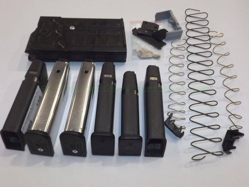 lot 155 image: Assorted pistol magazines and springs as shown