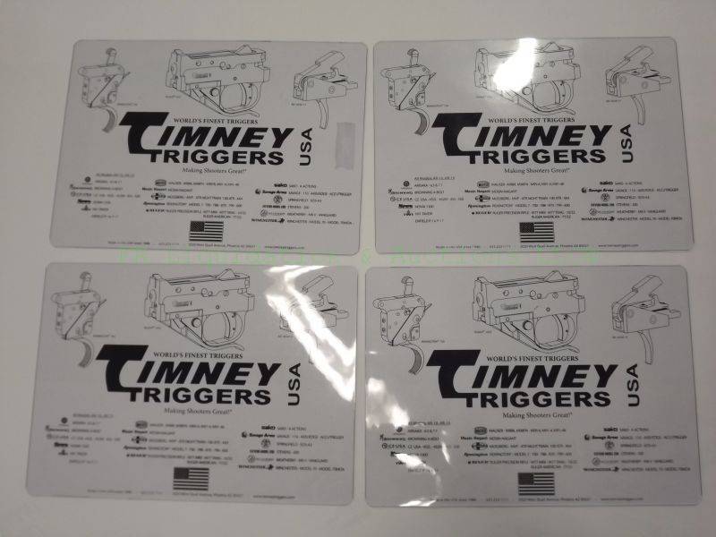 lot 167 image: Timney triggers counter top pistol pads