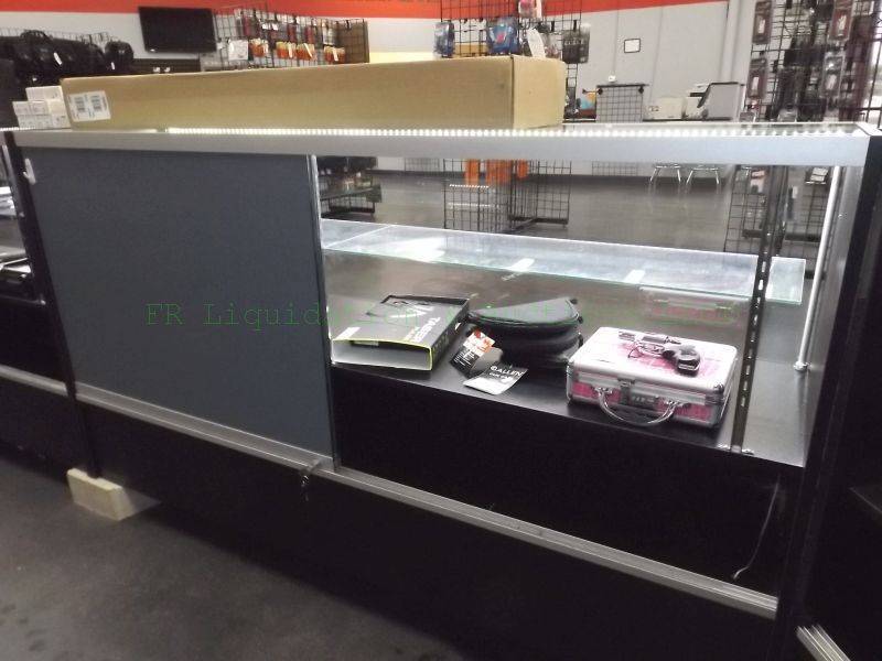 lot 169 image: Glass commercial display case with locks