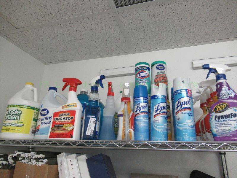 lot 382 image: Assorted cleaning supplies, Windex, Lysol and many more as shown