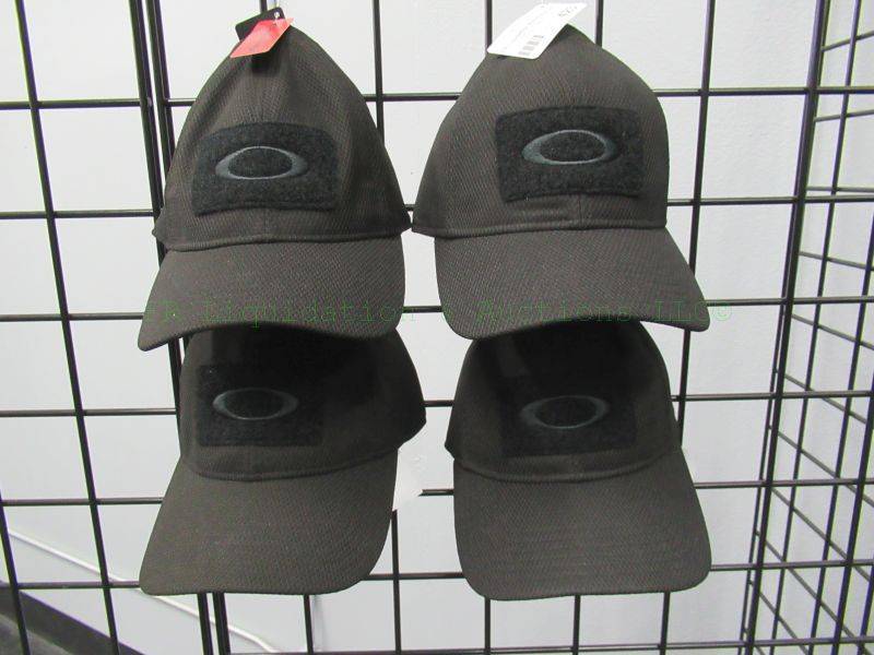 lot 423 image: NEW Oakley caps, tags attached