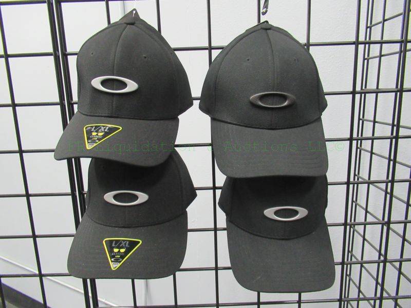 lot 431 image: NEW Oakley caps, tags attached