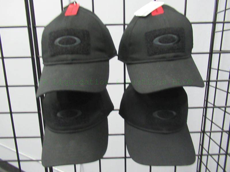 lot 433 image: NEW Oakley caps, tags attached