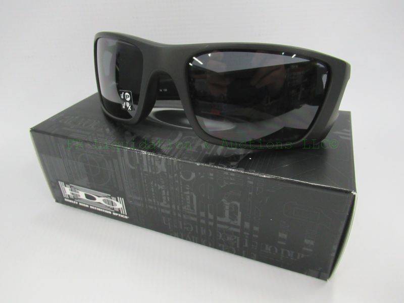 lot 453 image: NEW in box, genuine Oakley sunglasses