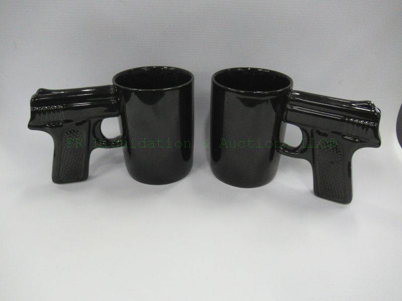 lot 477 image: Ceramic pistol grip coffee mugs