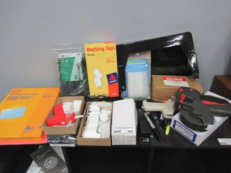 lot 487 image: Assorted price tagging supplies including Monarch price tag gun, tags, zip ties and more