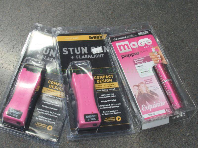 lot 516 image: NEW Sabre pink stun gun & LED flashlight and Mace pepper spray