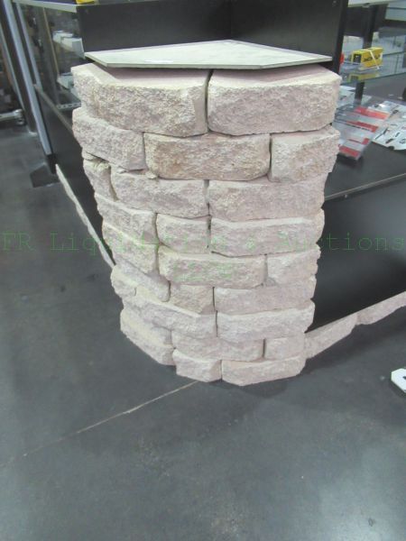 lot 908 image: Pavestone Limestone Retaining Wall Blocks, all stones under counters and pillars
