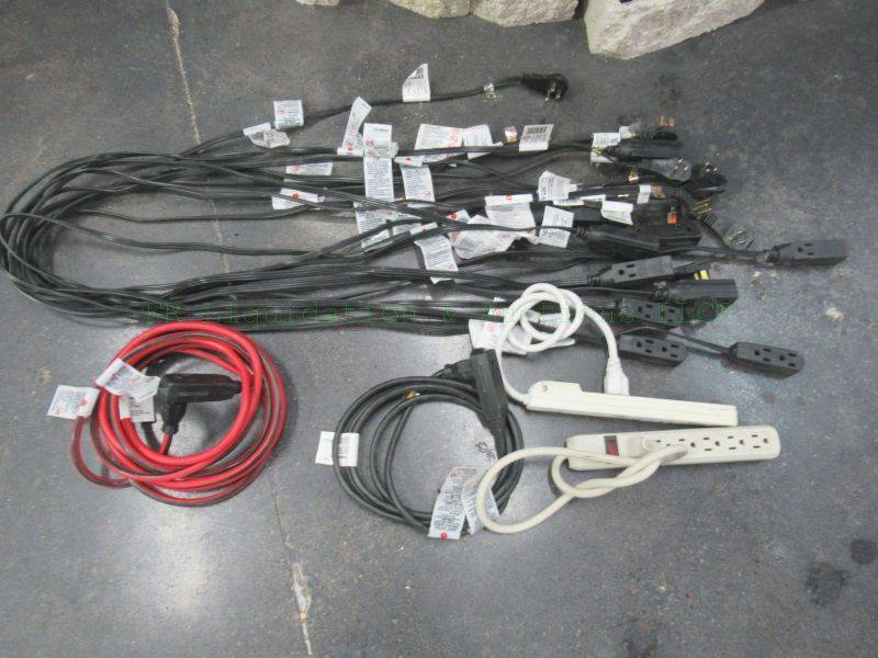 lot 909 image: Assorted extension cords and surge protector strips