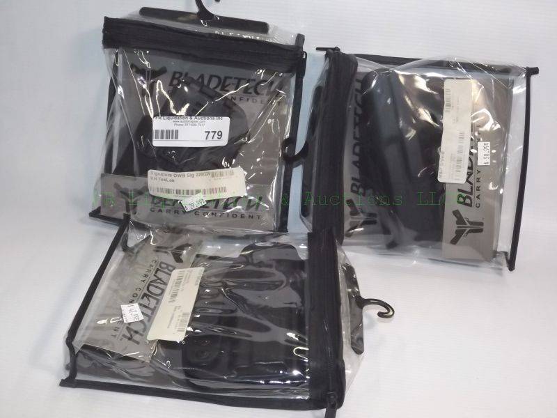 lot 779 image: NEW Bladetech pistol holsters for Sig and M&P