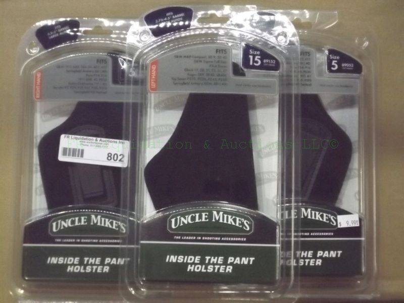 lot 802 image: NEW Uncle Mikes pistol holsters