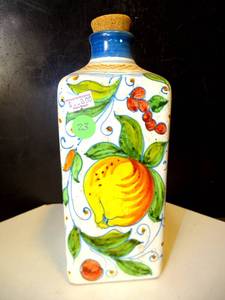 lot 23 image: HAND PAINTED ITALIAN FRUIT THEMED BOTTLE - ALL 4 SIDES HAND PAINTED WITH A DIFFERENT FRUIT PATTERN.