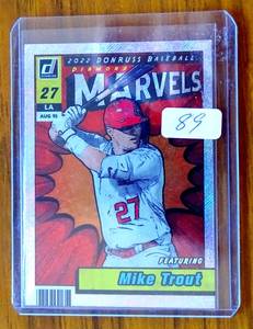 lot 89 image: $$$ 2022 Donruss Marvels Rapture #1 Mike Trout