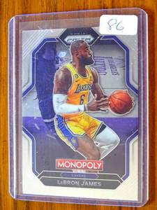 lot 86 image: 2022-23 Prizm Monopoly All-Stars Silver #PS7 Lebron James Lakers