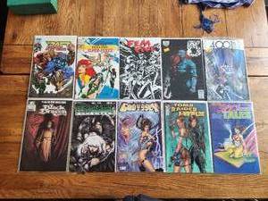 lot 83 image: Selection of 10 various vintage comics - The Pact, Teenage Super-Foxes, Fem Five, 5 Days, 4001AD, Black Dragon, AnimalAyshc, Godyssey, Tomb Raider, Spicy Tales