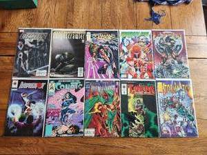 lot 84 image: Selection of 10 vintage comics - Marvel, Image Epic, Valiant - Order, Nightcrawler, Shamans Tears, YoungBlood, Prophet, Bloodshot, Coyote, The Vision, Turok, Storm Watch