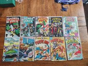 lot 15 image: Selection of 10 vintage comics - Marvel. DC