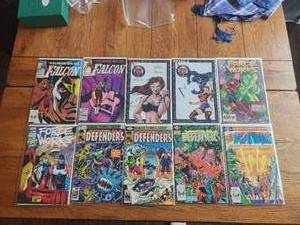 lot 20 image: Selection of 10 vintage comics - The Falcon, Fatale, Force Work, The Defenders - Marvel