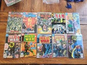 lot 60 image: Selection of 10 vintage comics - DC, Marvel - Millennium, Men of War, Cyclops and Phoenix, The NAM, No-Prize