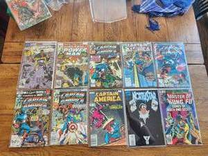 lot 62 image: Selection of 10 vintage comics - Marvel - Cage, Captain America, NorthStar, Master of Kung Fu
