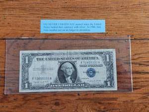 lot 33 image: 1957A - Silver certificate dollar bill