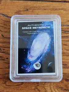 lot 37 image: Authentic Space Meteorite - in plastic case