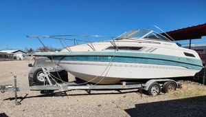 lot 96 image: Chaparral Signature 24 boat and aluminum performance trailer - no title - abandoned in storage for years (owner of storage facility needs it gone). All tires need air or replaced. More information to come
