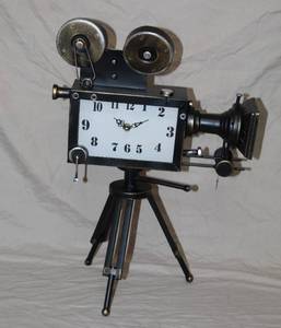lot 101 image: vintage movie camera miniature ornamental novelty collectible clock.