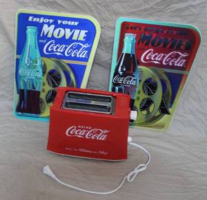 lot 103 image: 2-Coca Cola Movie Lenticular Wood Wall Decor and a Coca Cola toaster