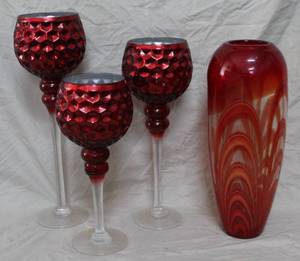 lot 113 image: hand-blown art glass vase, and set of three red glass stemmed hurricane candle holders.