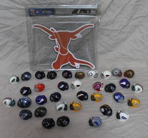 lot 117 image: a collection of mini football helmet collectibles. And more see pictures