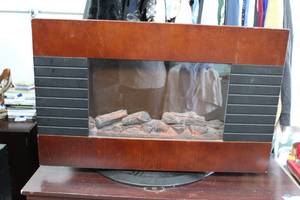 lot 2 image: electric fireplace heater heat blows out the top on this one tested and worked at the time it was posted