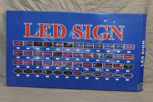 lot 35 image: Cowboys lid sign took out of box to show the star flashes try to get as many pics to show it off still wrapped in plastic