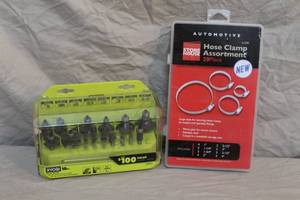 lot 37 image: Ryobi router bit set and Hose clamp assortment
