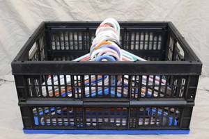 lot 75 image: Basket full of hangers