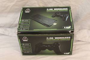 lot 84 image: Game Stick - Retro Video Game Player w Wireless Controllers